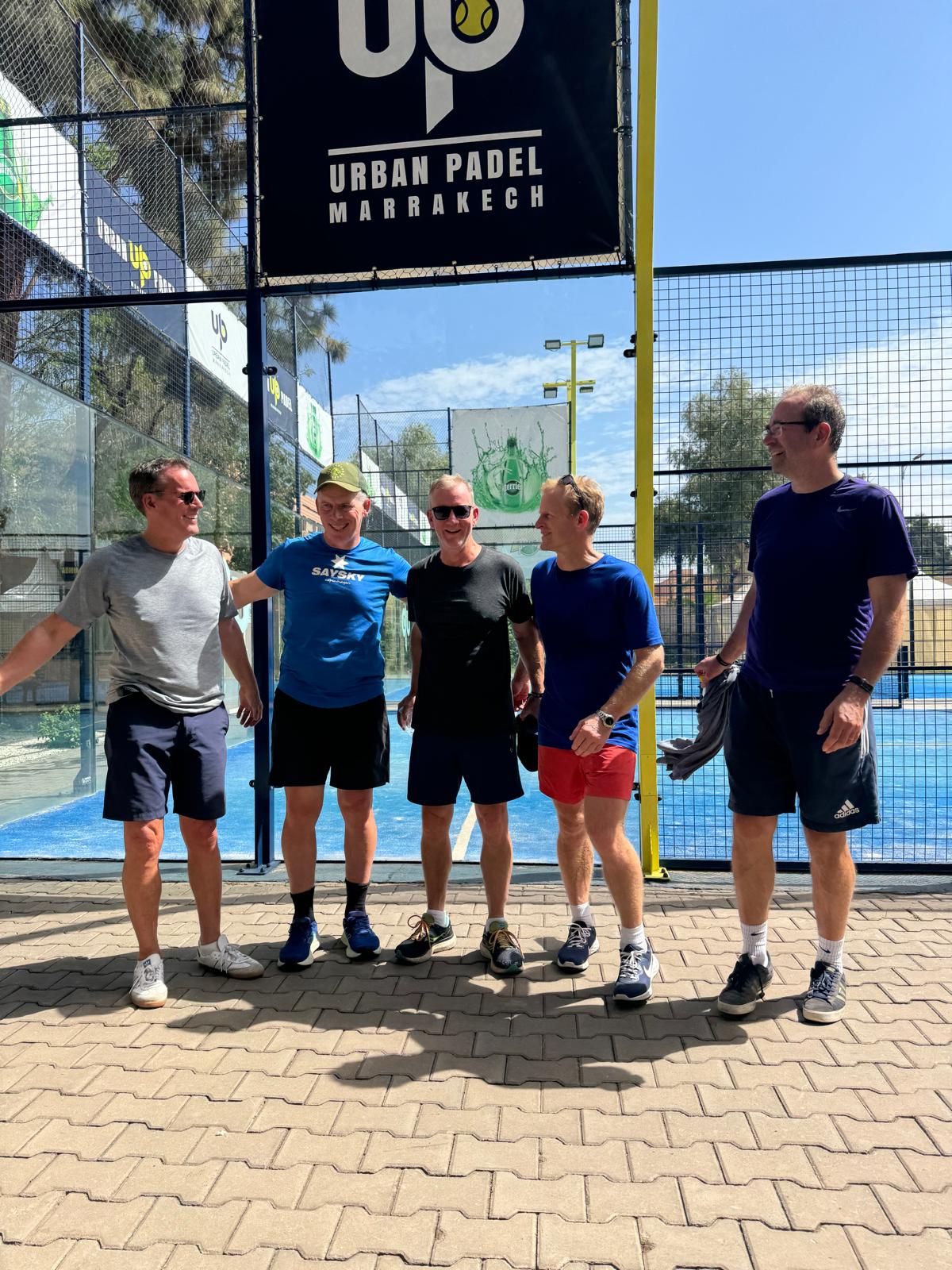 Four Reloaders on a padel court