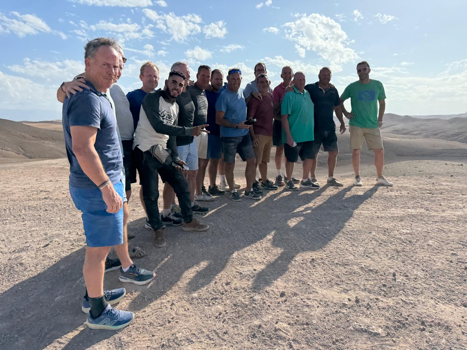 The group gathered beside the quad bikes